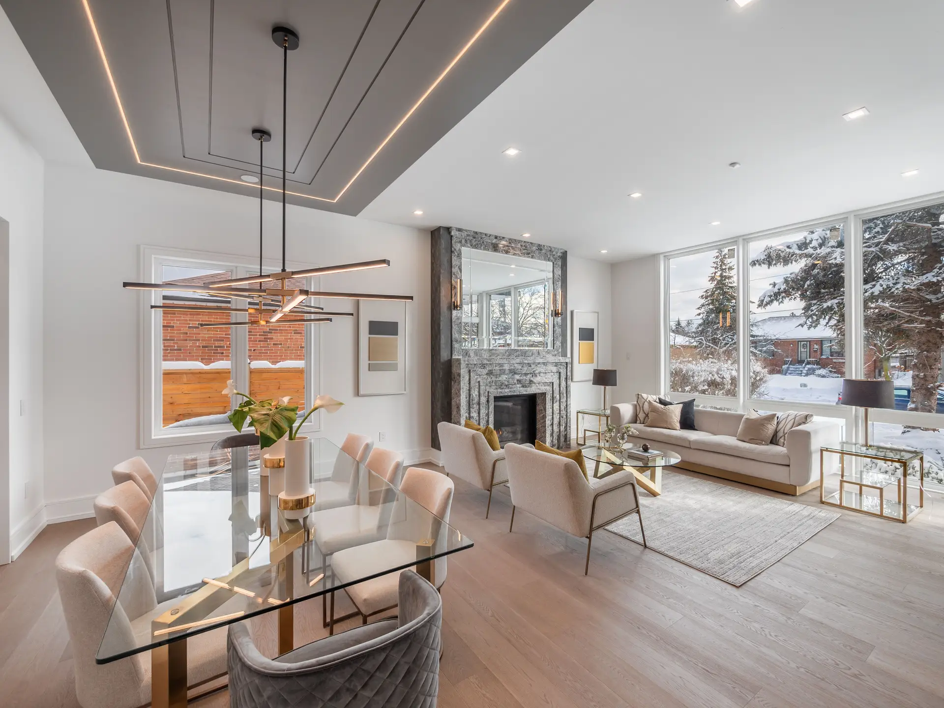 Spacious Toronto residence with warm custom wood joinery and natural light